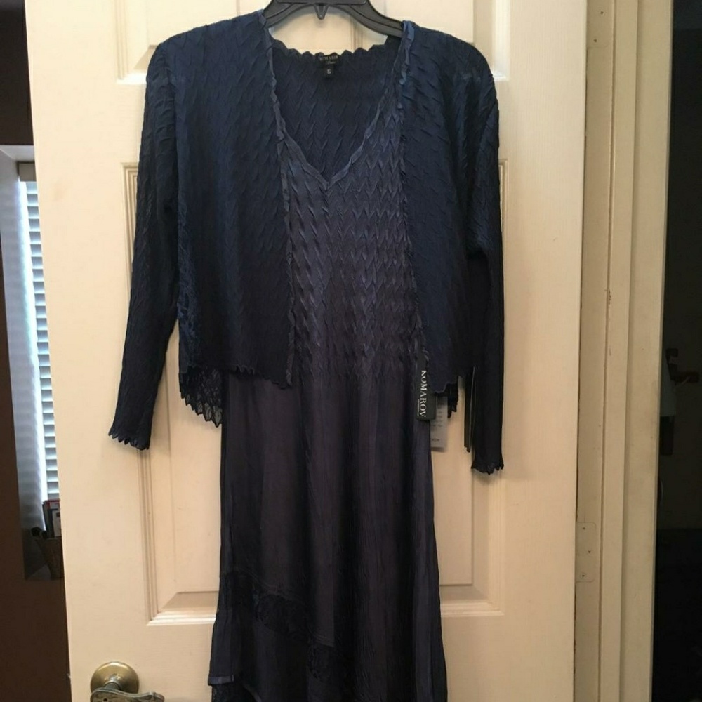 Dress shoulders were taken in to fit smaller lady